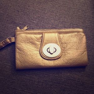 Gold wallet. Durable. Slightly used.